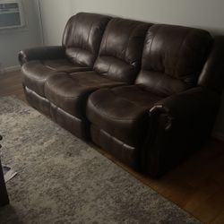 Brown Leather Electric Reclining Couch And Love Seat 