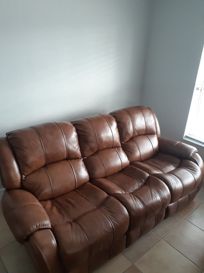 Two comfortable recliner sofas