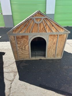 Wood dog house