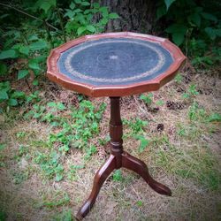 Mahogany & tooled leather stenciling tripod candle stand