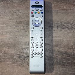 Genuine Philips (RC4345/01B) DVD / CBL / TV / VCR / AUX Remote w/ Battery Cover