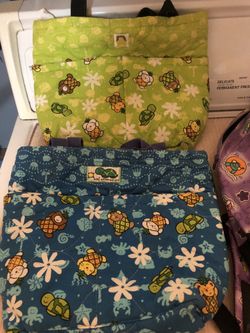 Taj of Honolulu totes