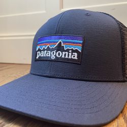 Patagonia P6 Trucker Hat Navy Mesh Adjustable SnapBack Brand New w Tags!  Elevate your style with this on-trend Patagonia P6 Trucker Hat in navy mesh.