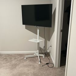 MOVE OUT SPECIAL - TCL TV With Modern Laptop Stand