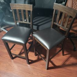 New Signature Design by Ashley Haddigan 24" Counter Height Upholstered Barstool 2 Count, Dark Brown