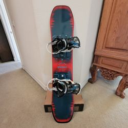 125cm Burton Process snowboard with Burton Mission Smalls bindings
