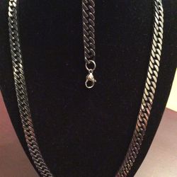 22” Stainless steel gunmetal chain and 8” bracelet....8mm.
