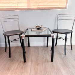 Pair of Italian Chrome And Black Leather Chairs 1980's
