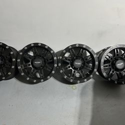 Set of 4 “satin black” Pro Comp 6 lug 16x8 Stryker 31 wheels in very good condition