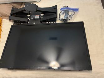 Used 32’ Fire TV complete with Wall Mount.