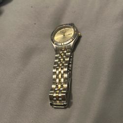 silver and gold watch