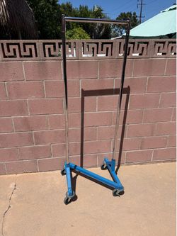 Small portable/ rolling / comes apart clothing rack