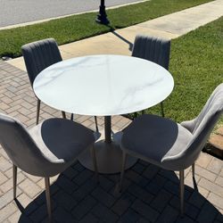 Dining table and 4 chairs