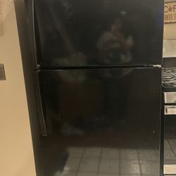 Whirlpool black Refrigerator Must Sell by Saturday !