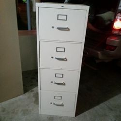 4 Drawer File Cabinet.     100 Or Best Offer