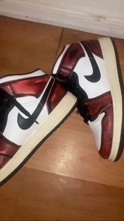 two pairs of jordan 1s