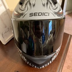 2 Sedici Helmets size Large and Medium