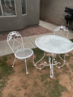Nice metal table and two chairs