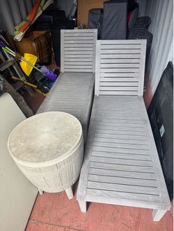 Pair of patio lounges with side table