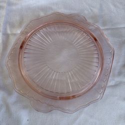 vintage pink Depression glass cake plate in the "Mayfair Open Rose" pattern, manufactured by the Anchor Hocking Glass Company. 