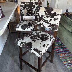 Two Faux Cow Print Bar Stools