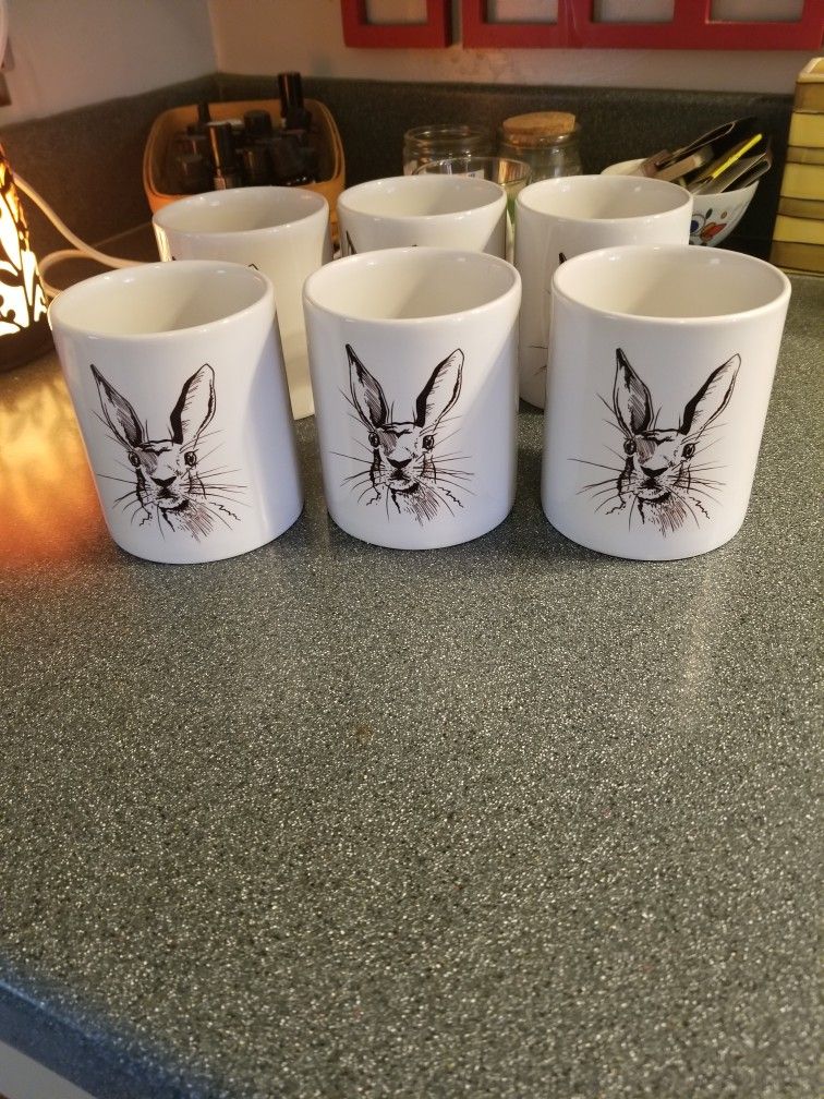 6 rabbit coffee mugs. No makers mark.