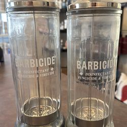 2 Barbicide jars