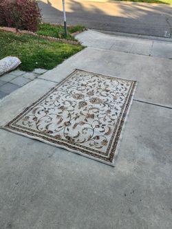 58 x 90" decent smaller area rug 