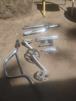 I have a chrome handlebars cranks with aluminum pedals I have a chrome forks and other miscellaneous parts