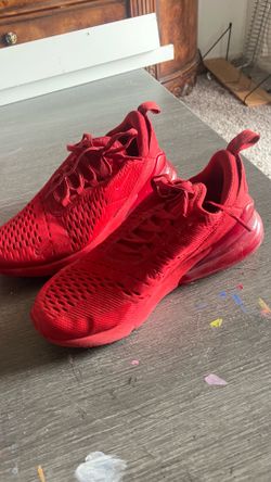 Red NIKE workout shoes
