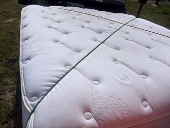 Pillow top mattress for sale Kingstown system three body great shape measurements are 6 foot 4 x 6‘ two.