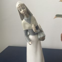 Lladro Porcelain Figurine “Woman Bringing Bread With Dog Around”