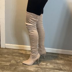 Cream colored thigh high boot