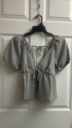 Brand new light grey peplum top size S Juniors