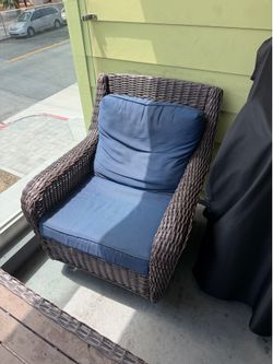 Two Wicker swivel chairs