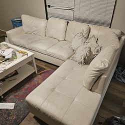 White Leather Sectional And 