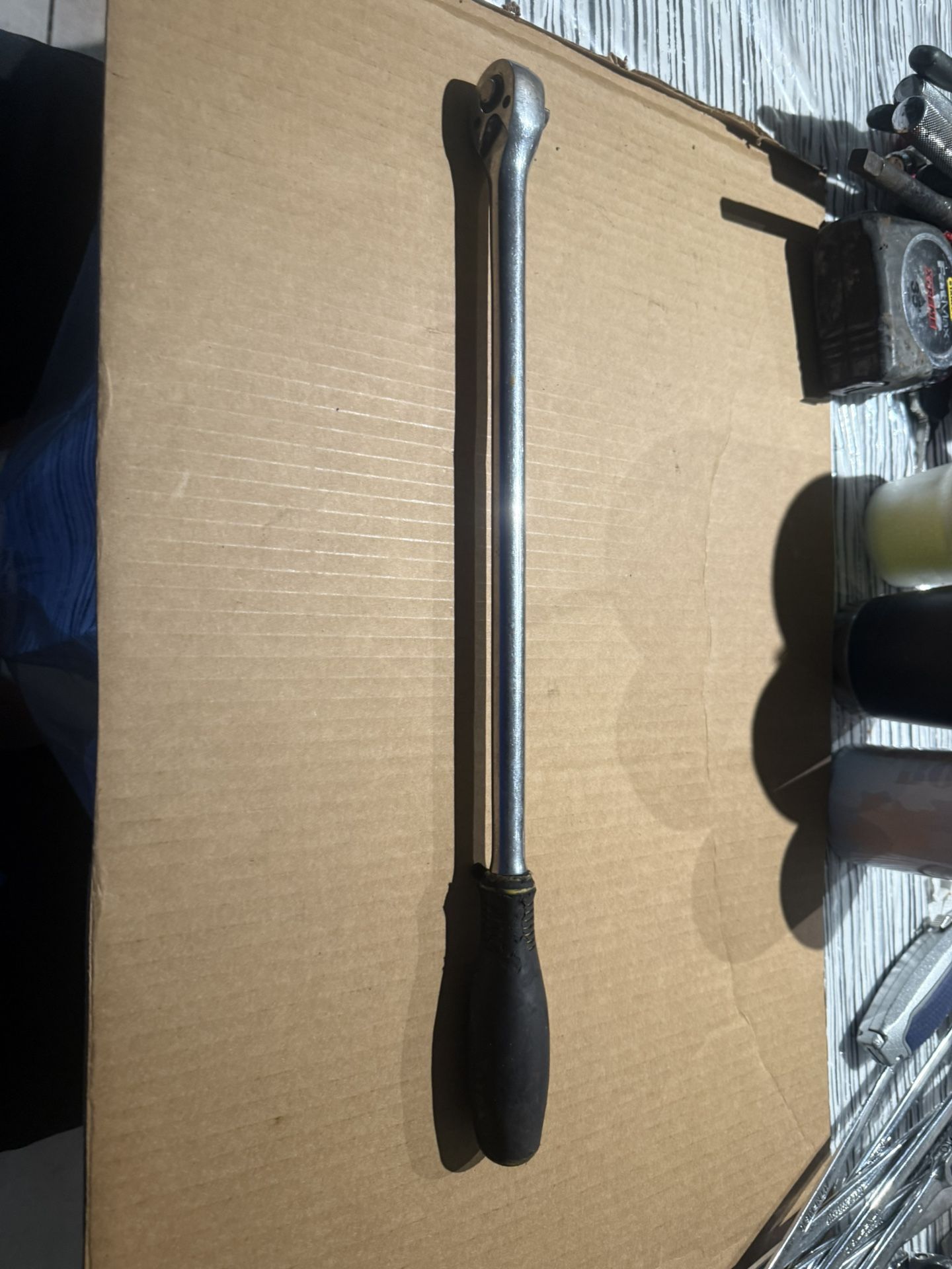 Long 3/8” drive ratchet (titan) works great about 18” long $20 in n Lakeland