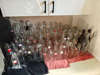 Glass flip top bottles