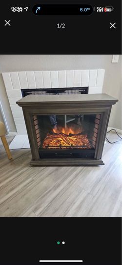 Automatic fireplace with heat settings and remote