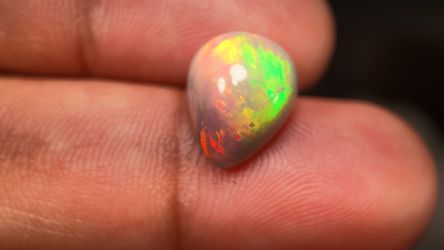 Natural Ethiopian Welo Opal 4.4 Ct Pear Cabochon Red Green Fire 13x11mm