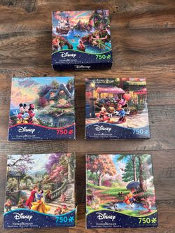 Thomas Kinkade 750 piece Disney puzzles