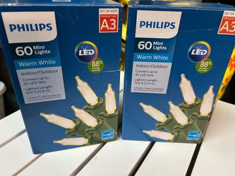 Brand New boxes of 60 Warm White mimi Christmas tree lights