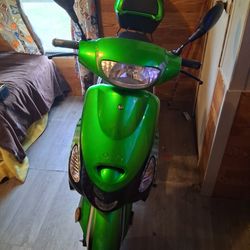 2025 Black And Green Moped