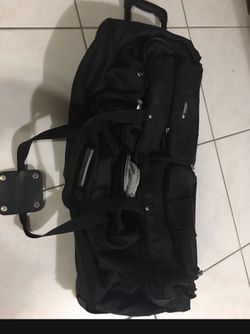 Large Delsey Rolling Duffle -travel suitcase