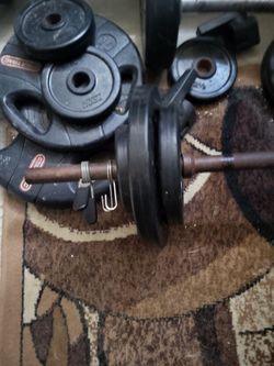 Set of 8 Bar Bells each with  4 10lbs  2 5lbs & 2 2