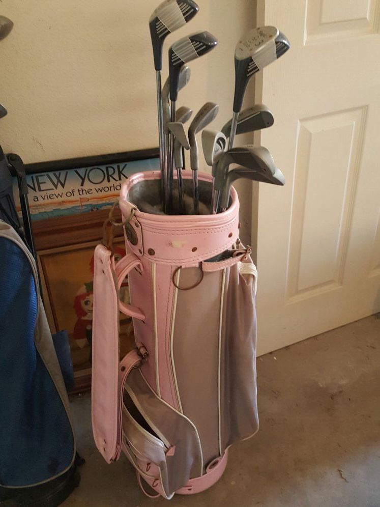 Golf clubs and bag... new