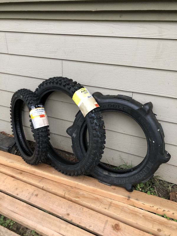 Dirt bike tires front and rear. And new paddle for Sale in Portland, OR