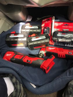 Brand new Milwaukee m12/m18 multi tools , m12 cp20 and 4 m18 XC8.0 batteries