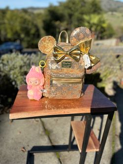 LoungeFly sequins Disney backpack with matching Disneyland Ears