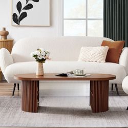 Ebern Designs 47.24" Oval Shaped Coffee Table With Storage   Multilevel Storage: This Multi-Tiered Coffee Table offers ample Storage Solutions for you